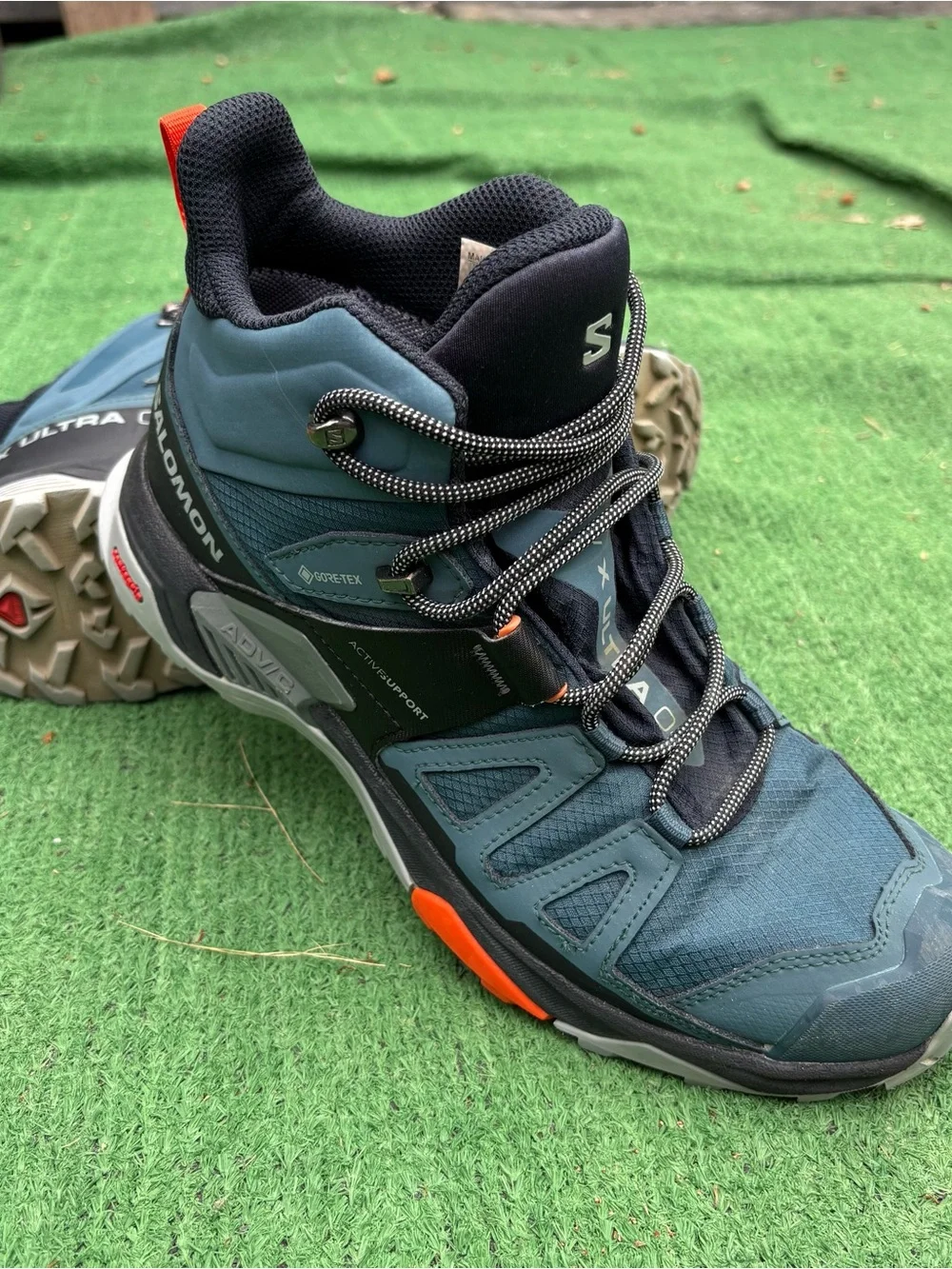 Salomon Men's Teal Black Mid-Height Trail Boots with Orange Accents